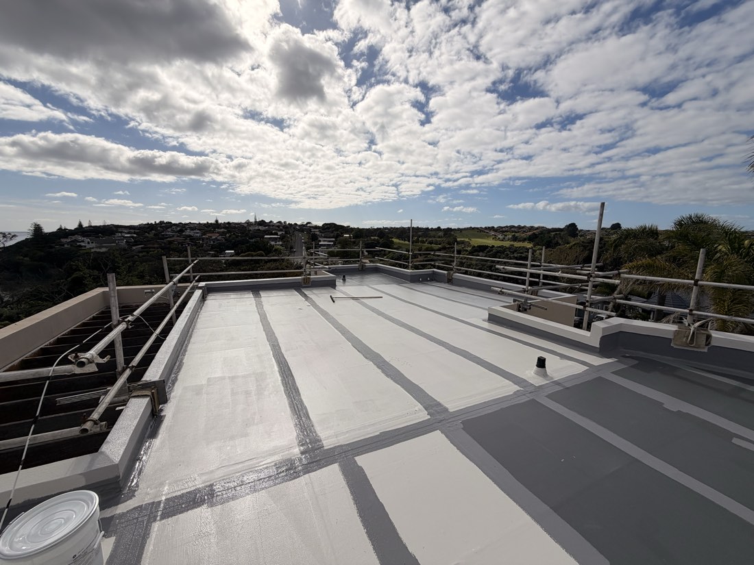 Liquid-applied membrane covering a large roof deck in Auckland