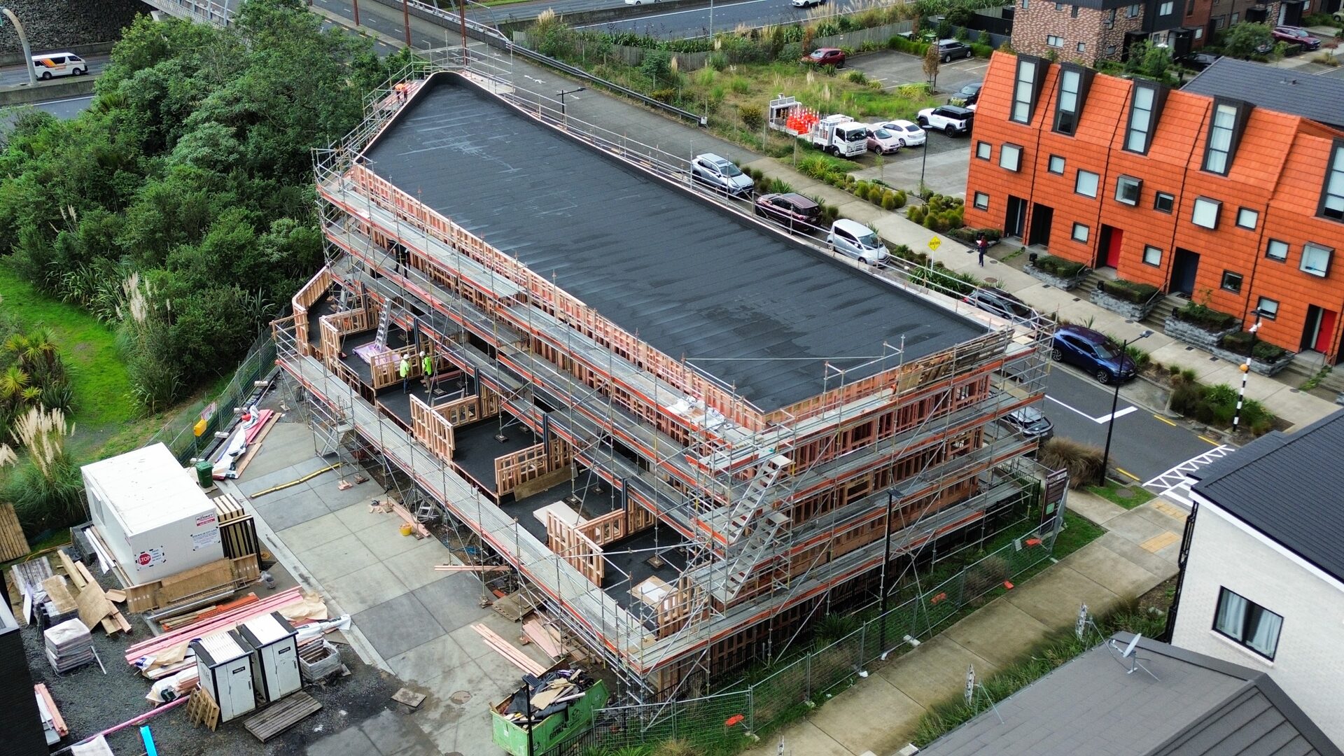 Torch-on waterproofing project Manukau Auckland — aerial view of Nuraply 3PM roof and decks on a new build