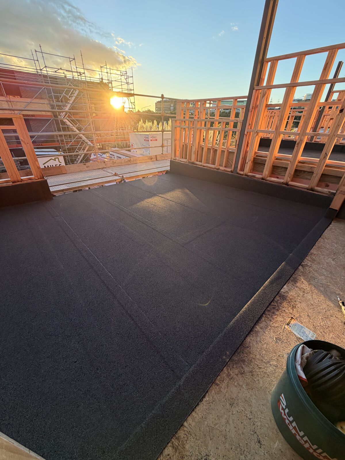 Torch-on waterproofing Manukau — Nuraply 3PM membrane at deck edge and outlet