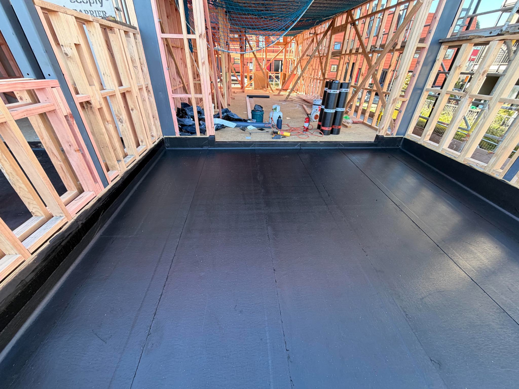 Torch-on waterproofing membrane installation in New Zealand