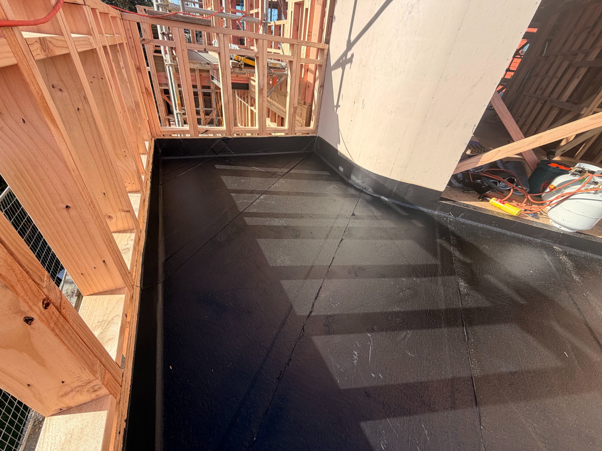 Professional waterproofing membrane installation for residential project