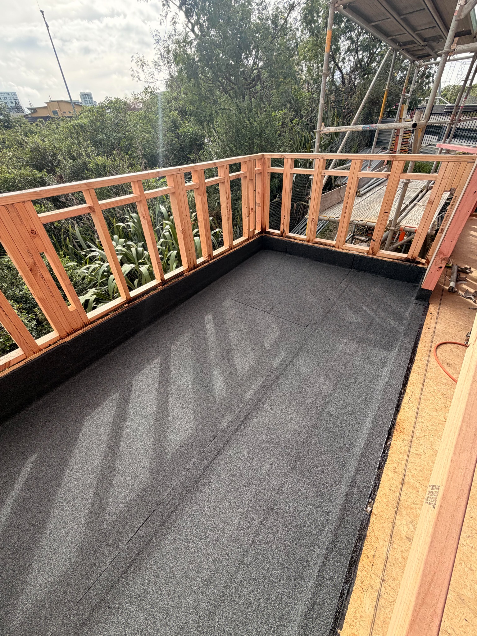 Torch-on membrane balcony waterproofing project Auckland