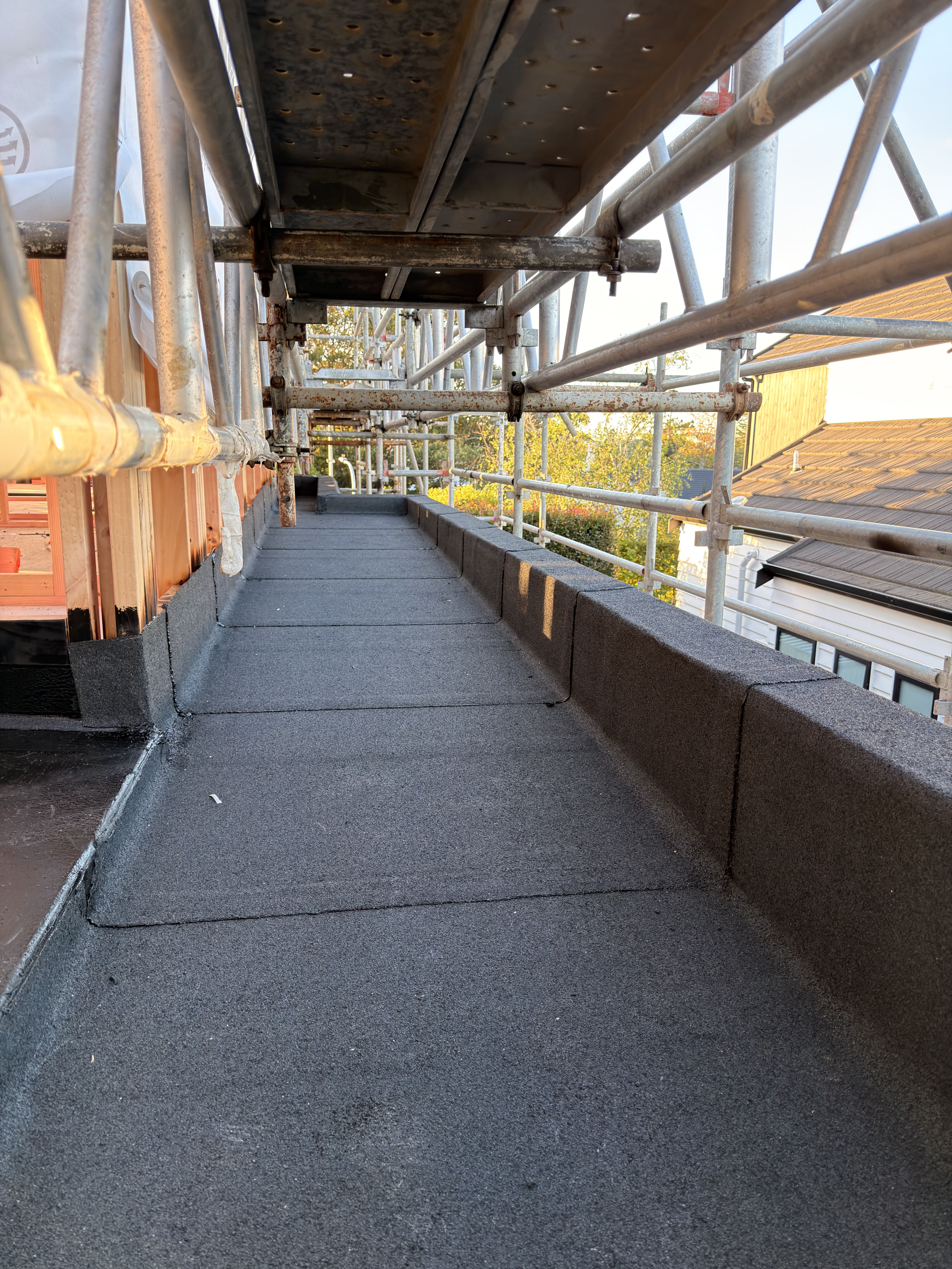 Roof leak repair Auckland - damaged membrane removal